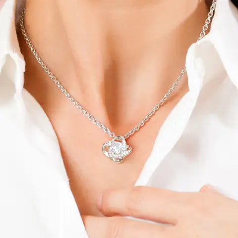 The love knot necklace worn on the neck